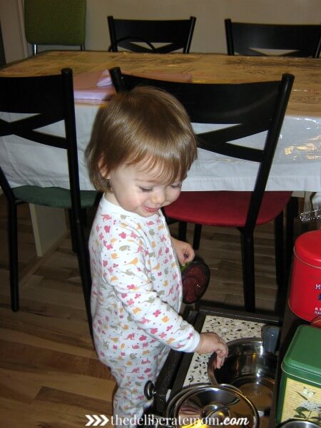 A play kitchen DIY project! We worked to make this kitchen look like our own kitchen. It was inexpensive and was built from the base of a small IKEA end table. Easy, cute, inexpensive and original! Check out these instructions on how to build a build a play kitchen! 