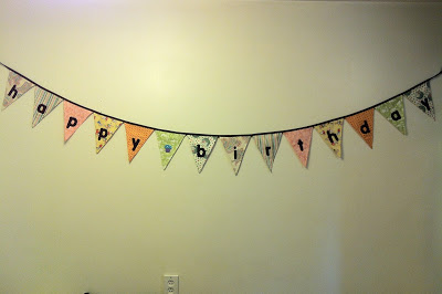 Want a beautiful birthday decoration that you can use year after year? Here are some tips on how to sew a stunning happy birthday banner. #sewing #birthdaydecor