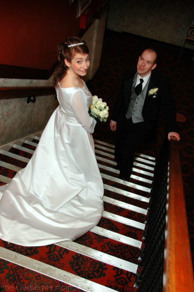 Formal wedding photos in a historical movie theatre.