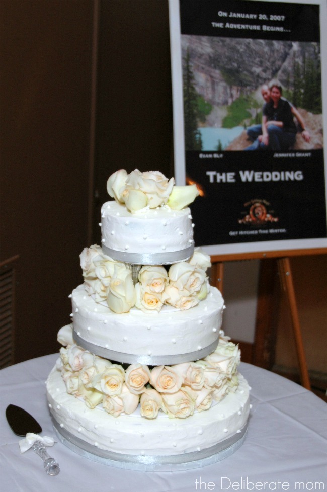 White rose topped wedding cake.