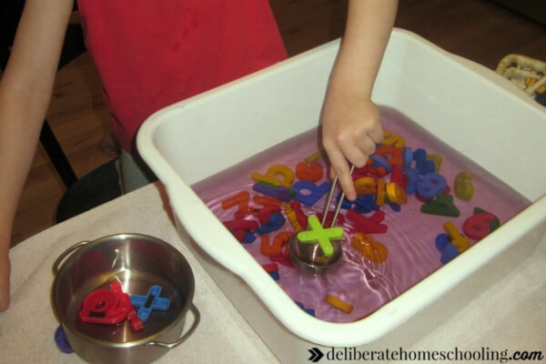 It's important not to rush children into reading. However, there are some fun ways to prepare and teach your preschooler to read... such as playing "alphabet soup".