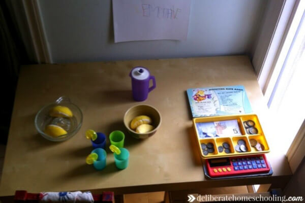 A lemonade stand is a fun space to play in!